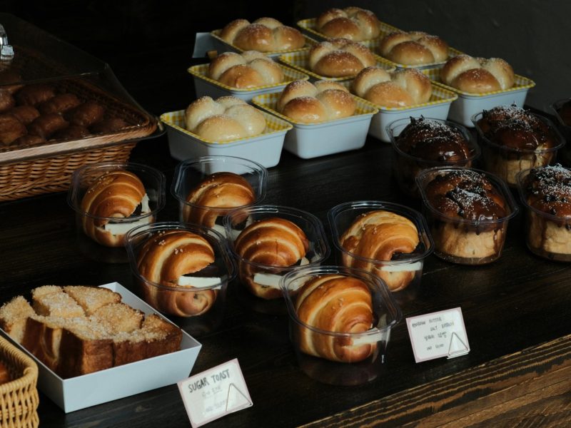 A variety of artisan baked goods on display in a Ho Chi Minh City bakery.